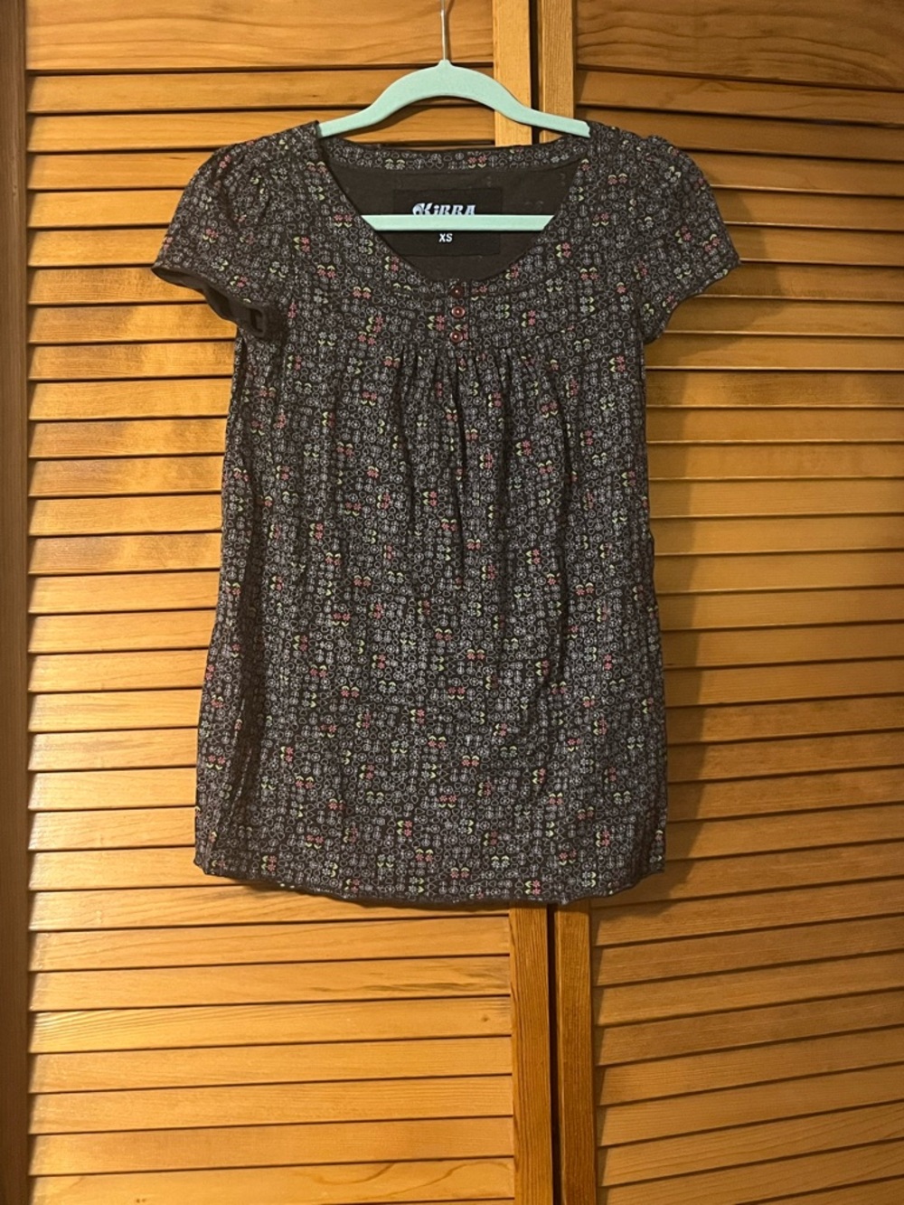 Kirra Gray with Floral Peace Sign Henley Top